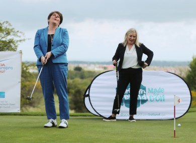 Arlene Foster and Michelle O'Neill at Clandeboye Golf Club yesterday