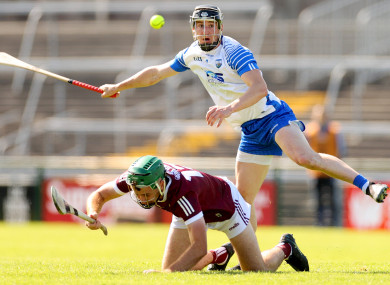 Galway’s Brian Concannon and Conor Gleeson of Waterford compete for the ball.