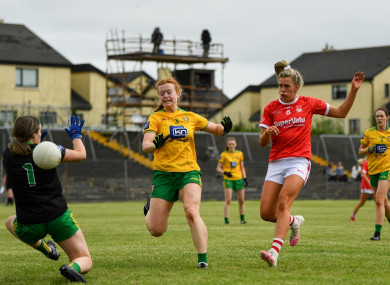 Máire O'Callaghan of Cork shoots to score her side's third goal.