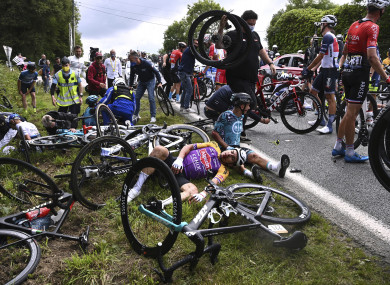 Cyclists at the Tour de France after a crash during the first stage.