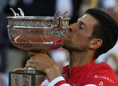 Serbia's Novak Djokovic kisses the cup after defeating Stefanos Tsitsipas of Greece.