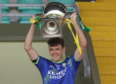Kerry's David Clifford lifts the Division 1 trophy in 2020.