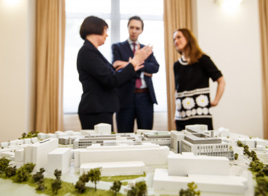 A meeting between Minister Simon Harris and hospital heads in 2017 with a model of the project
