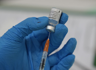 A health worker prepares to administer Pfizer's Covid-19 vaccine (file photo)