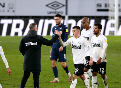 Derby County star Jason Knight with manager Wayne Rooney.