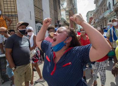 A woman shouts during an anti-government protest in Havana, Cuba