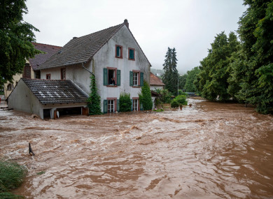 Houses are submerged on the overflowed river banks in Erdorf, Germany, as the village was flooded.