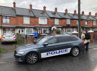 Police at the scene in Brompton Park, Belfast, where a baby died and another young child was critically injured.