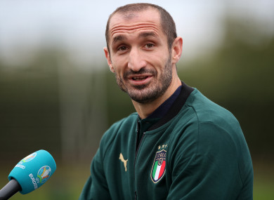 Italy's Giorgio Chiellini talks to the media before a training session.