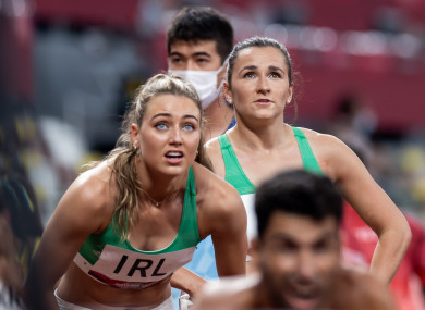 Sophie Becker and Phil Healy watch on anxiously before Ireland's place in the Olympic 4x400m mixed relay final was confirmed.