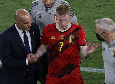 De Bruyne is taken from the field, injured.
