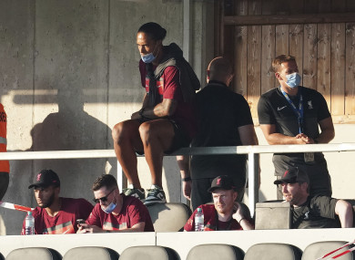 Virgil van Dijk watching a recent pre-season friendly against Mainz.