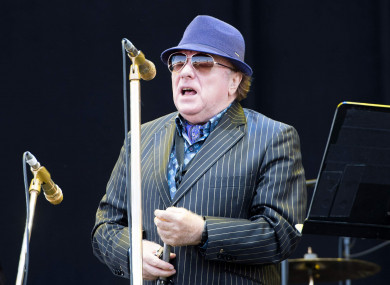 Van Morrison performs on stage.