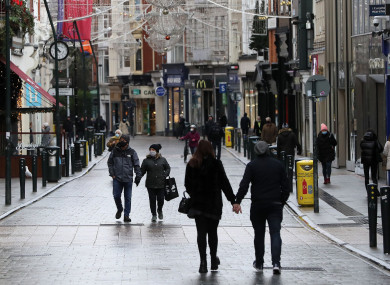 People walk on Grafton street in Dublin’s city centre