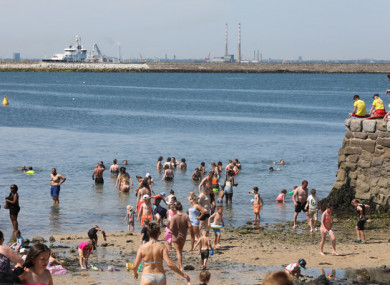 File image of people at Sandycove Beach in Dublin in July.