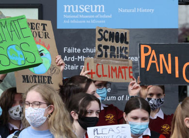 Students protest outside the Department of the Taoiseach in Dublin today.