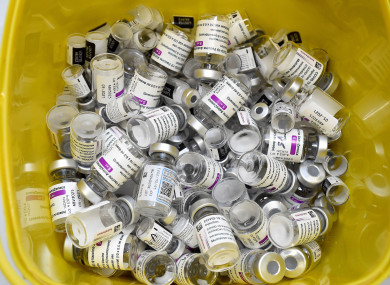 A box with empty vials of coronavirus disease (COVID-19) vaccines is pictured at an HSE vaccination centre.