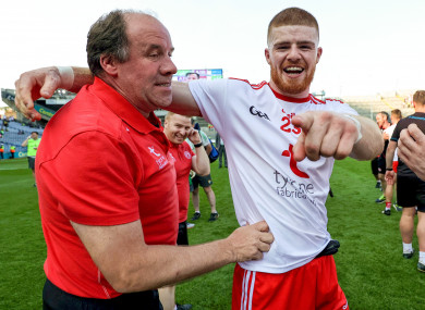 Feargal Logan celebrates with Cathal McShane after Tyrone's win over Kerry.