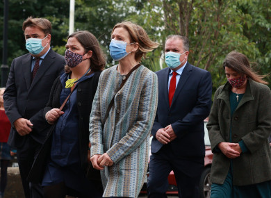 (Left-right) John Junior, Mo, Therese, Aidan (left back) and Aine (right back) during the funeral of their mother Pat Hume