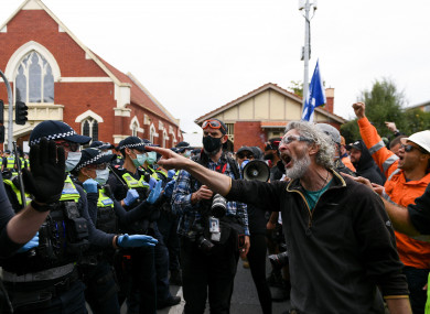 Protestors and police during the Melbourne protest.