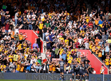 Wolves striker Raul Jimenez celebrates with his team-mates.
