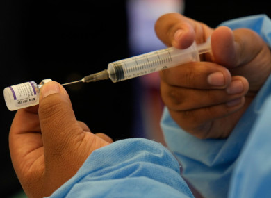 A healthcare worker prepares a dose of the Pfizer Covid-19 vaccine