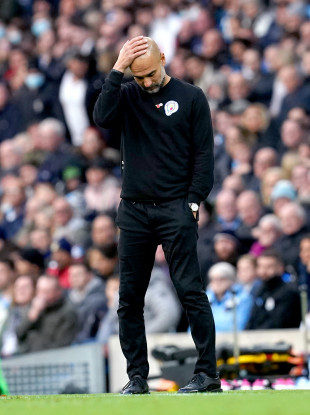 A dejected Pep Guardiola this afternoon.