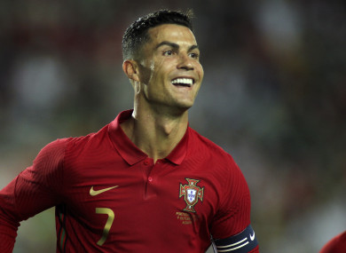 Portugal's Cristiano Ronaldo smiles after scoring.