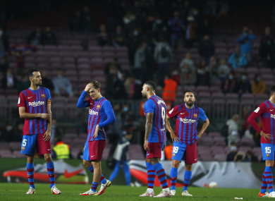 Barcelona players react after the game.
