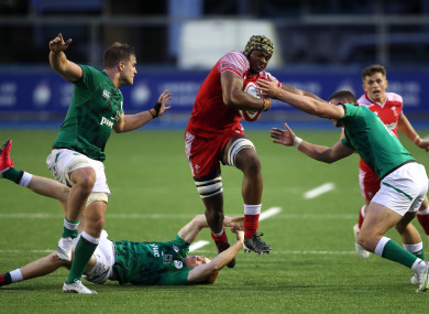 Christ Tshiunza in action for the Wales U20 team.