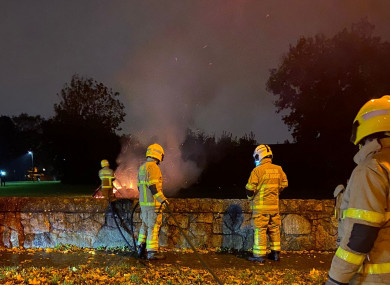 Members of Dublin Fire Brigade extinguishing a bonfire in Rathfarnham