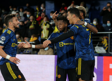Manchester United's Cristiano Ronaldo (right) celebrates scoring.