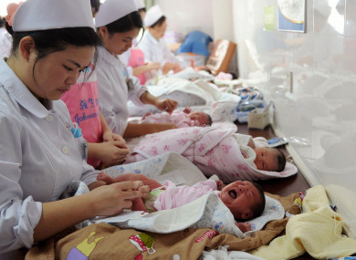 Nurses attend to newborn babies at a hospital in Hefei, Anhui province.