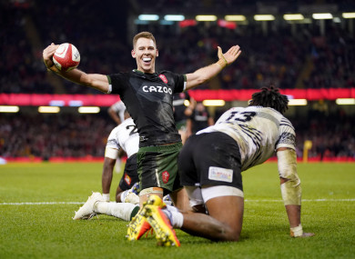 Wales’ Liam Williams celebrates after scoring a try during the Autumn International match at Principality Stadium.