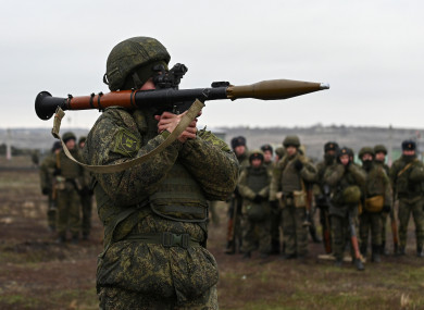 A grenade launcher operator of the Russian armed forces takes part in combat drills at the Kadamovsky range in the Rostov region.
