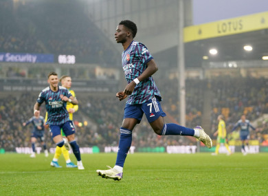 Bukayo Saka celebrates scoring for Arsenal.