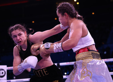 Katie Taylor lands a left hook on Firuza Sharipova.