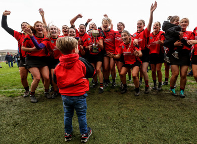 Mary Leacy’s son Jake celebrates with the Oulart team after their win.