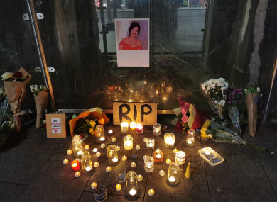 Floral tributes at a vigil attended by hundreds in Galway city centre for Ashling Murphy.