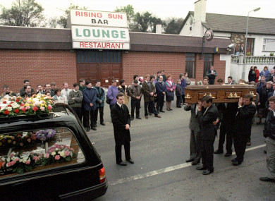 The coffin of Steven Mullan being led past the Rising Sun Bar at Greysteel, Derry in 1993.