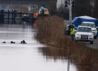 Garda divers are seen in the canal in Tullamore this evening.