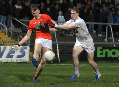 Armagh's Rian O'Neill facing Daniel Flynn of Kildare.