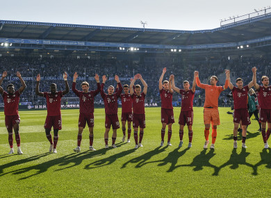 Bayern Munich players salute the fans after their win.