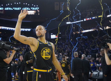 Stephen Curry celebrates after the Warriors defeated the Denver Nuggets in Game 1.