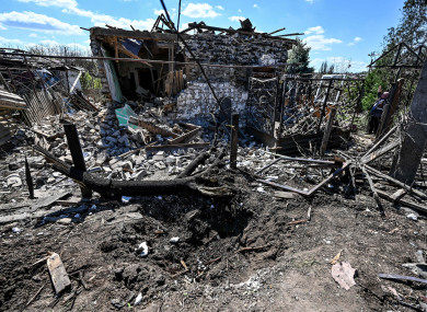 Rubble covers the premises of a house after a Russian missile attack in Zaporizhzhia.