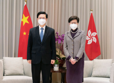 Hong Kong Chief Executive-elect John Lee and Chief Executive Carrie Lam