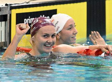 Ariarne Titmus celebrates the new world record.