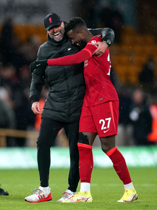 Jurgen Klopp and Divock Origi.