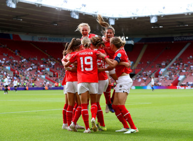 Austria's Katharina Naschenweng celebrates her goal.