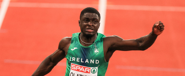 Israel Olatunde crossing the line in second place in the semi-final of the men's 100m.